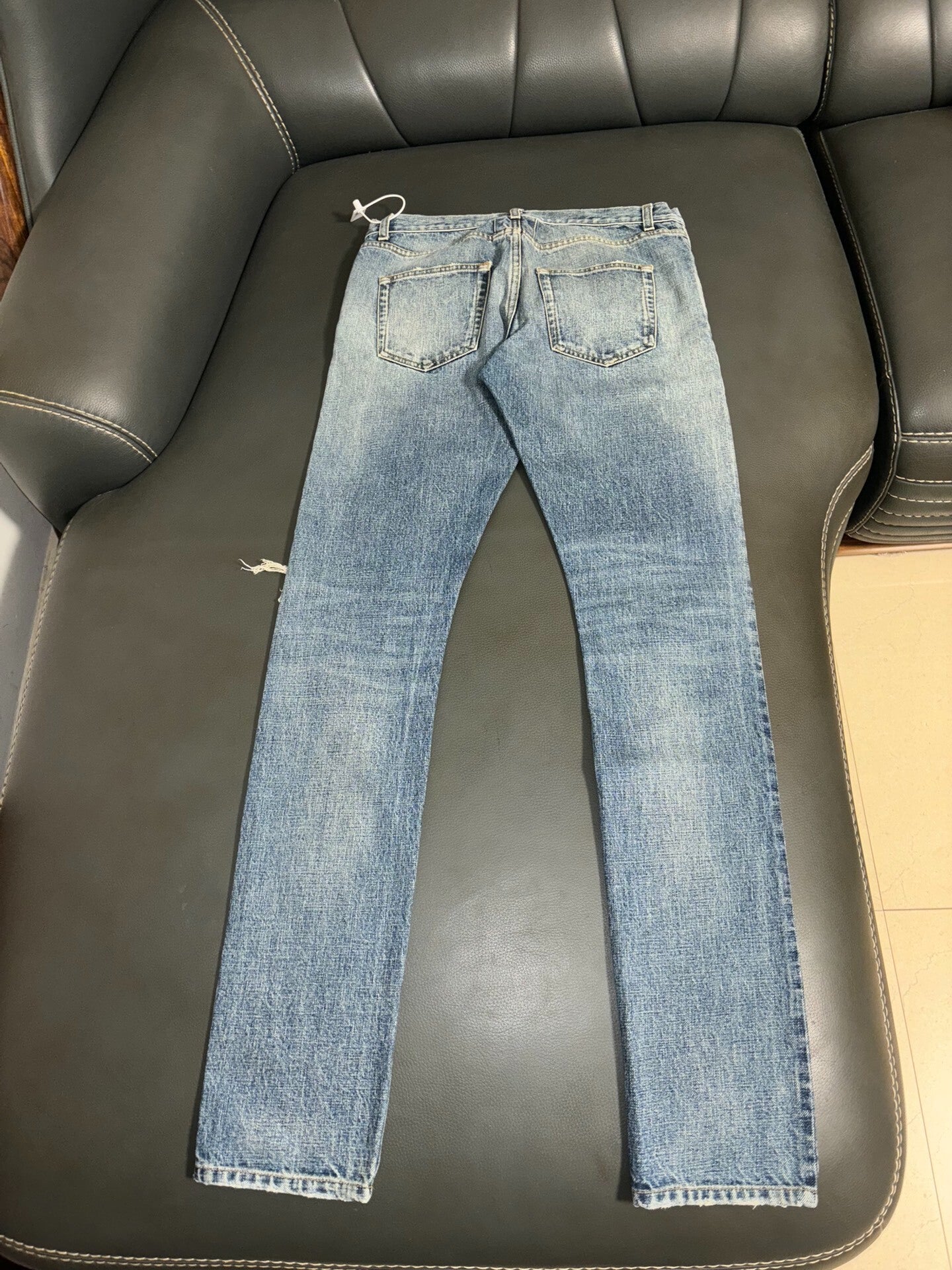 Saint Laurent Distressed Denim Jeans in Blue