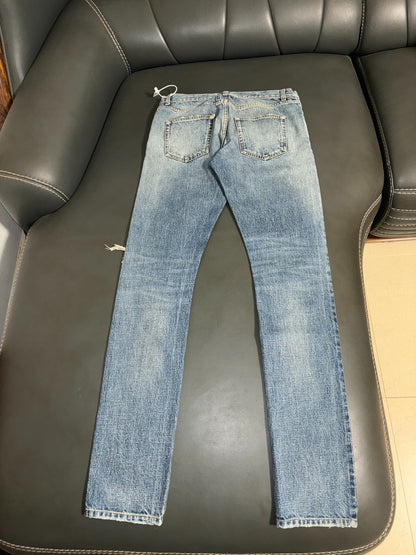 Saint Laurent Distressed Denim Jeans in Blue