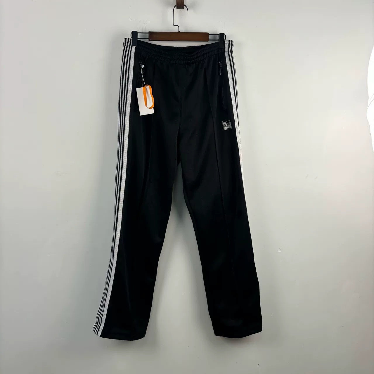 black striped side pants by Needles