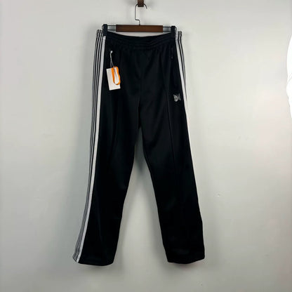 black striped side pants by Needles