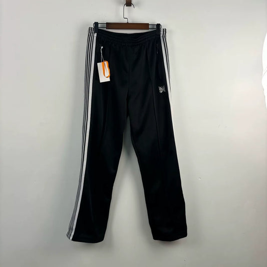 black striped side pants by Needles