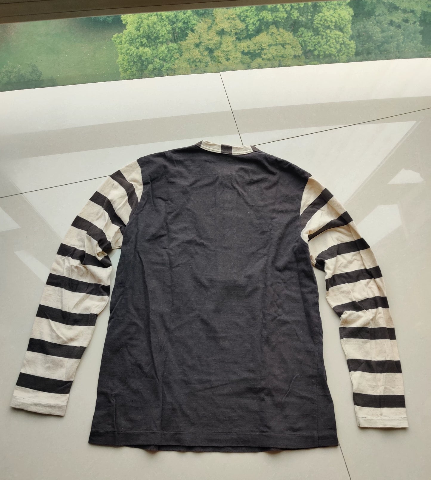 gray and white striped long sleeve shirt