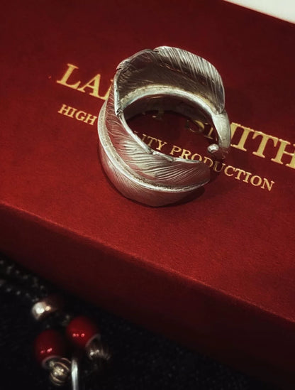 larry smith feather silver ring