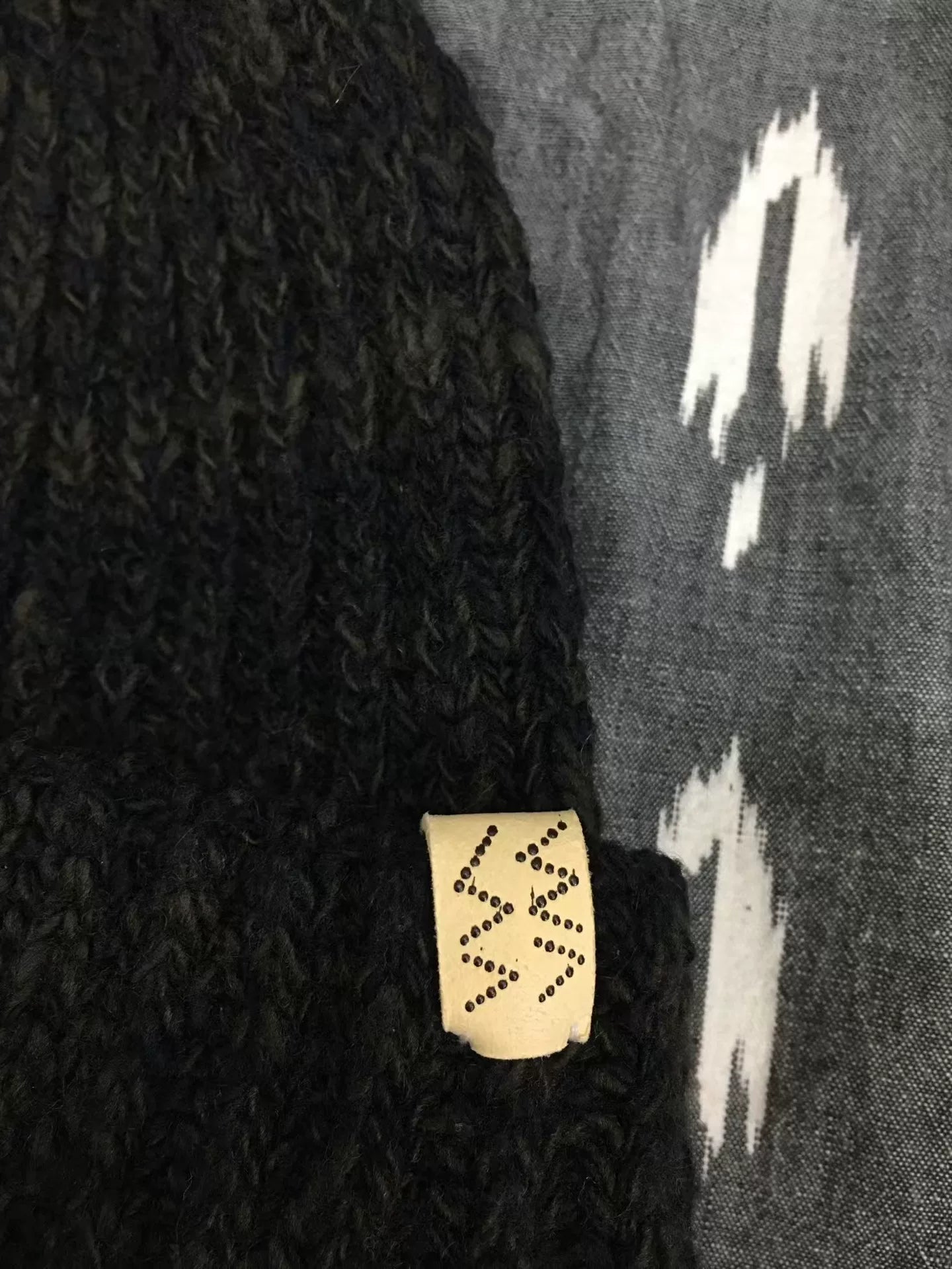 visvim black knit cap with mud dye technique