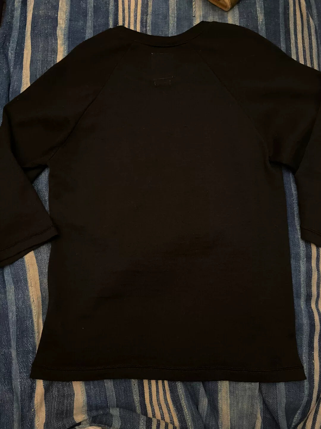 peerless black long sleeve knit top