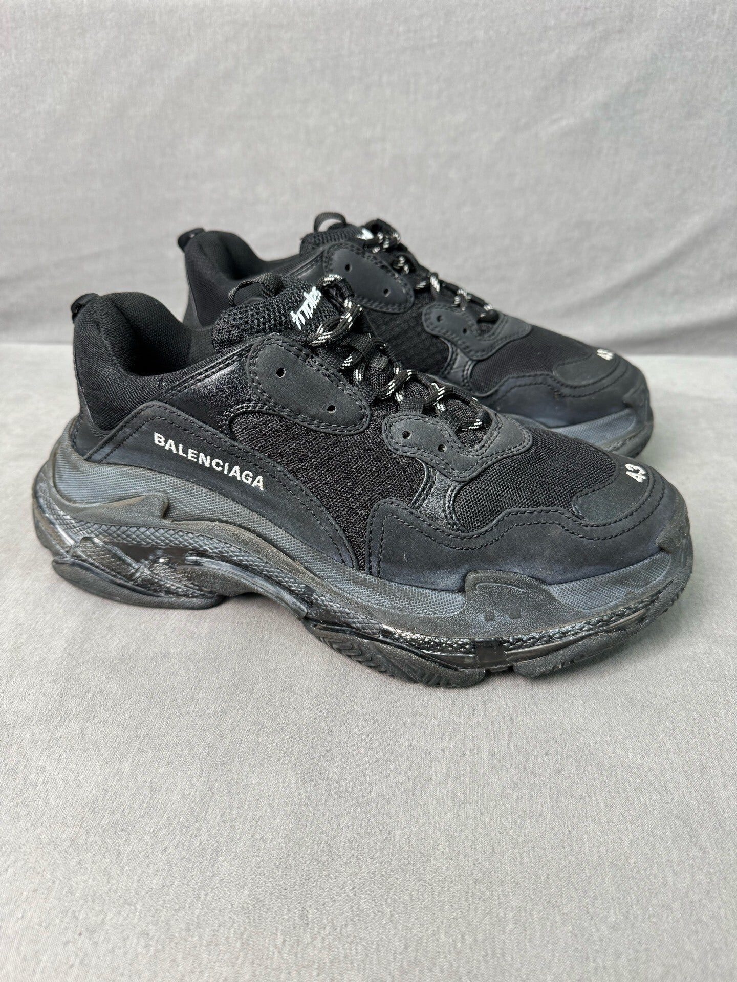 balenciaga triple s distressed black sneakers