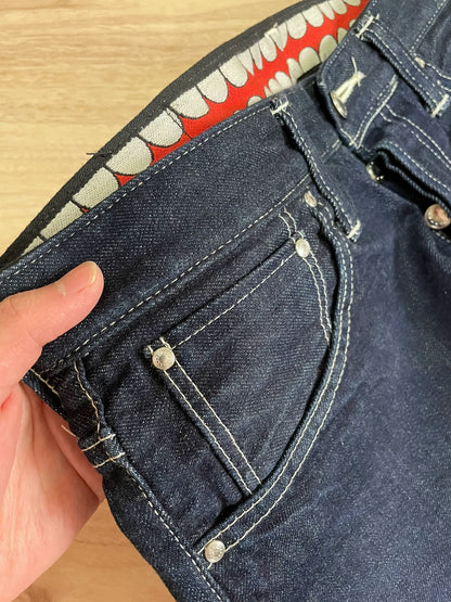 red tooth KAWS original color denim pants