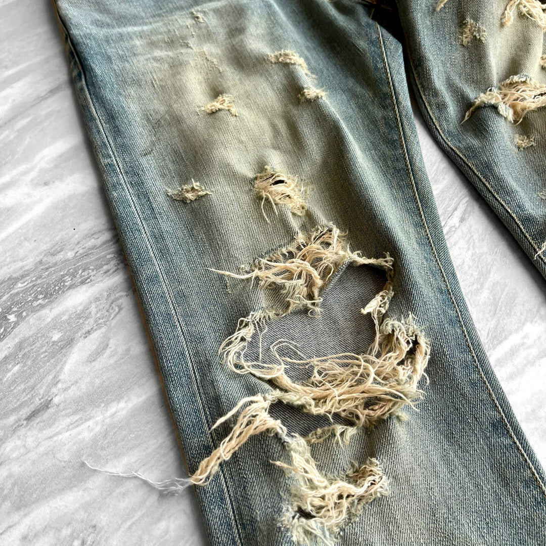 SAINT LAURENT Distressed Blue Jeans