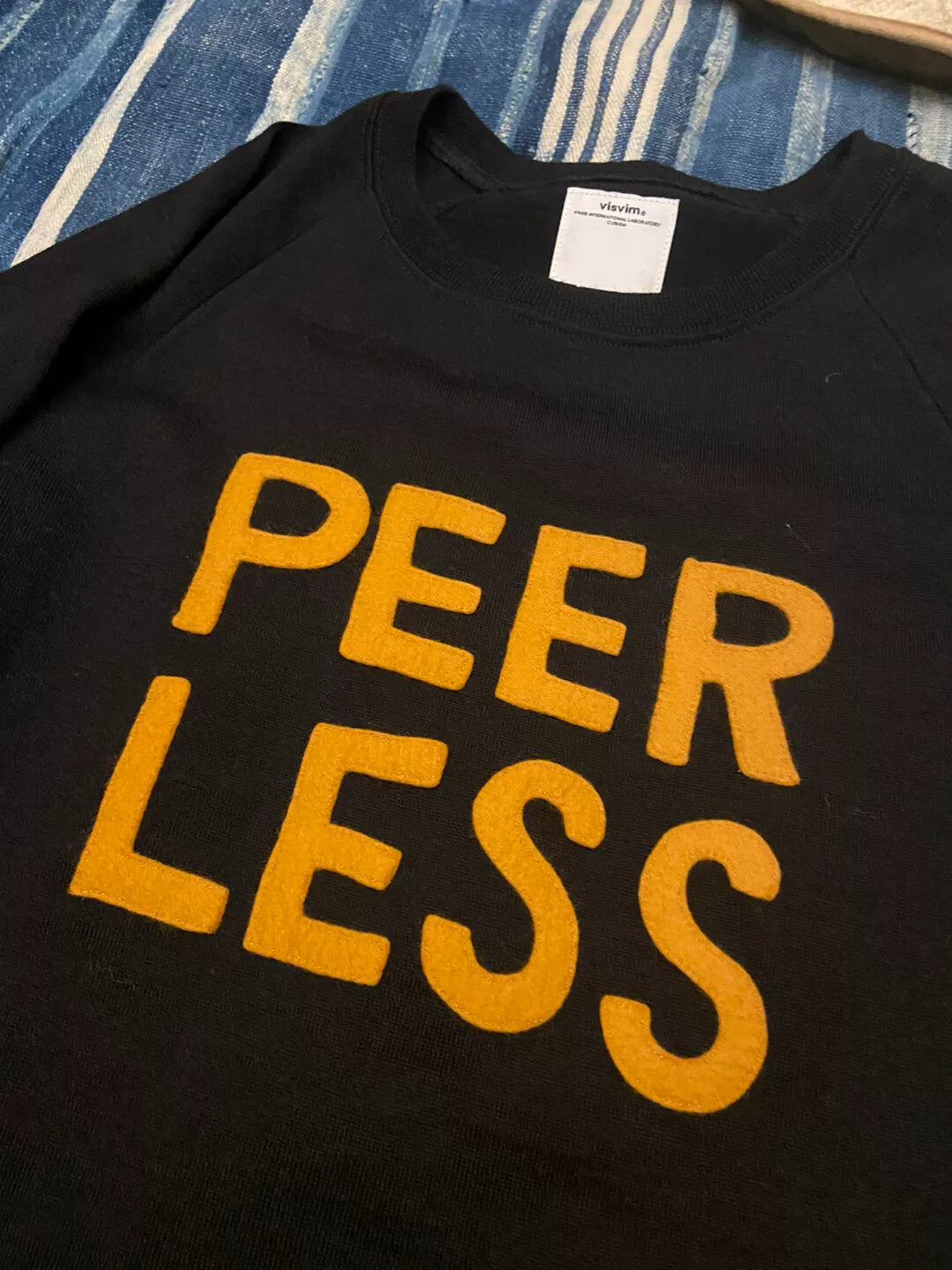 peerless black long sleeve knit top