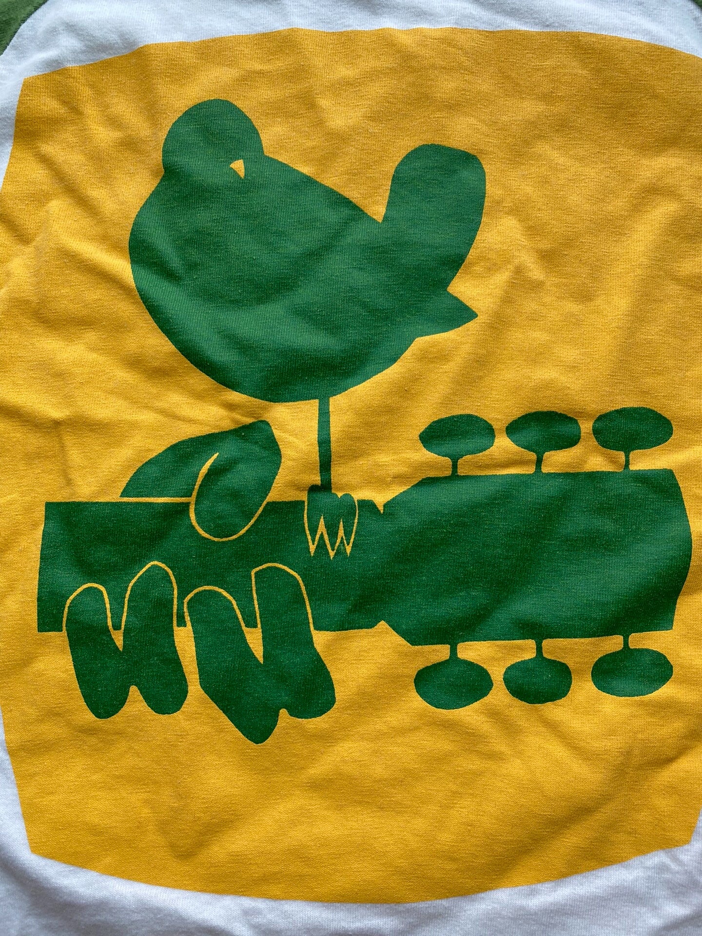 vintage green and white peace tee