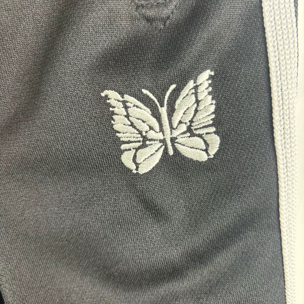 black striped side pants by Needles