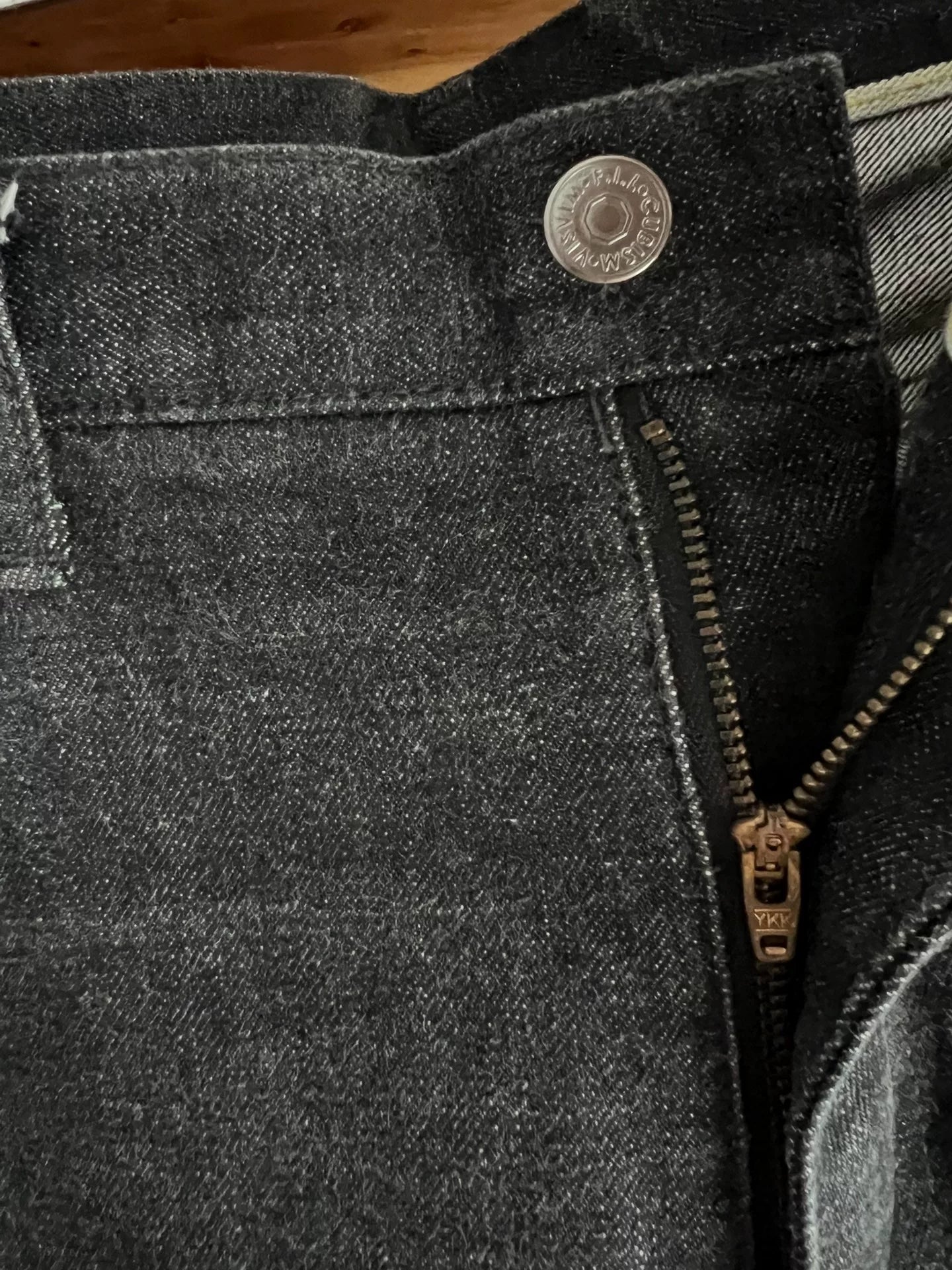 visvim black denim pants with colorful details