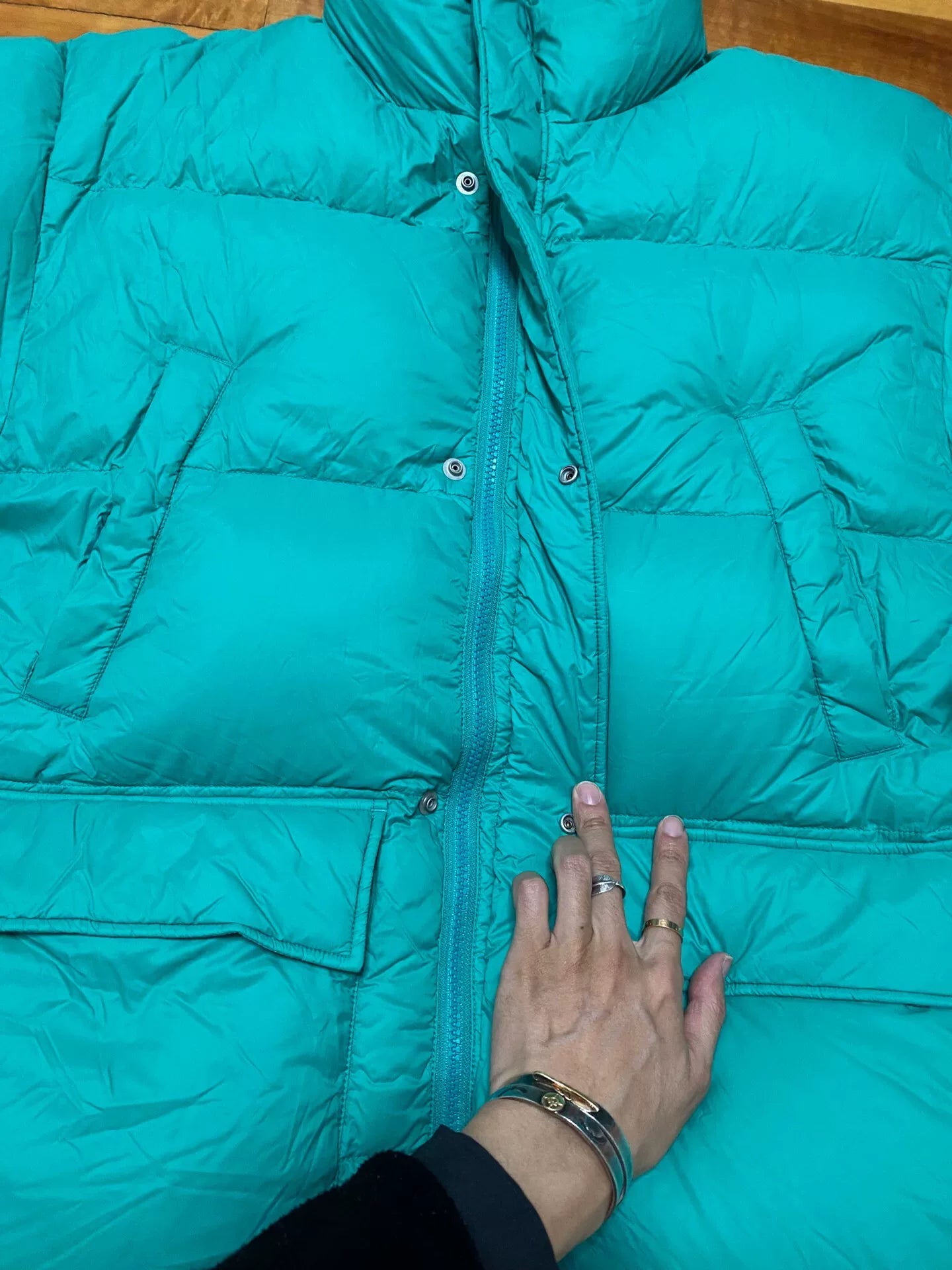 stylish teal puffer jacket for winter wear