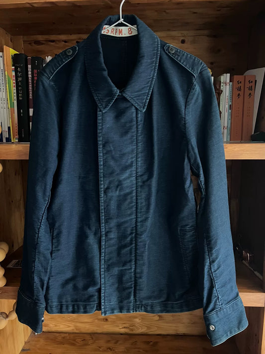 blue dyed motorcycle jacket with subtle vintage touch