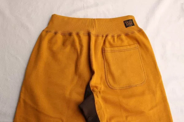 stylish yellow and brown sweatpants