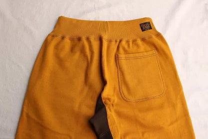 stylish yellow and brown sweatpants