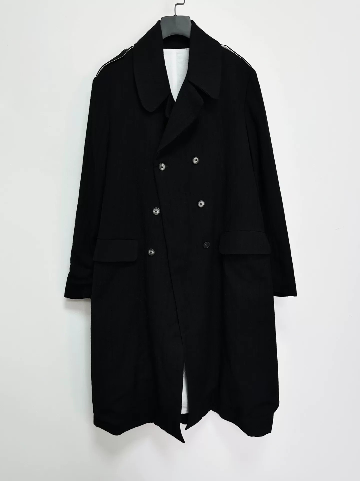 black double-breasted wool long coat