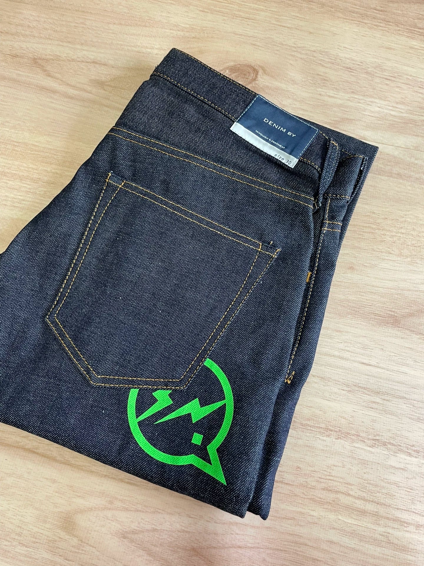 denim by vanquish green logo cropped jeans