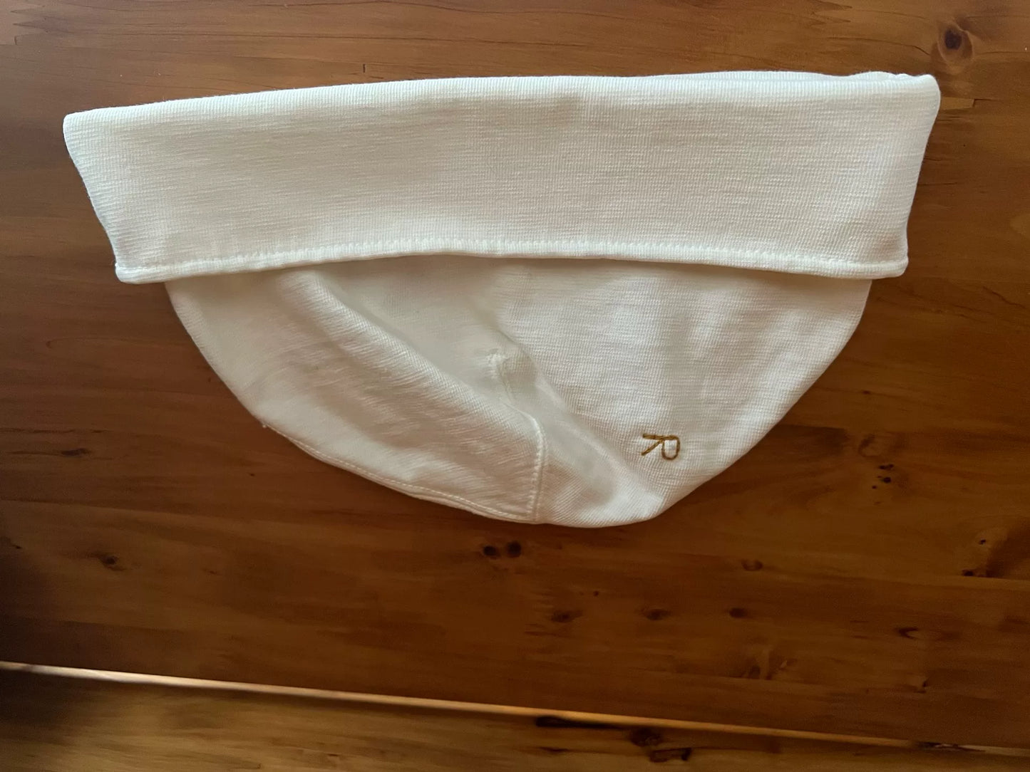 white knitted beanie with logo