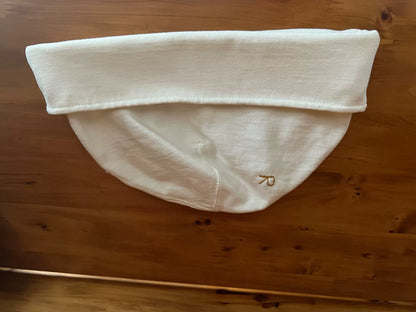 white knitted beanie with logo