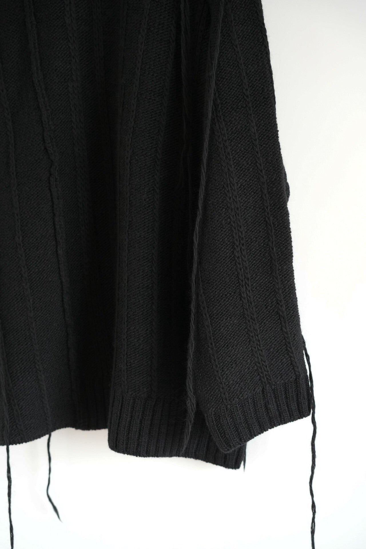 black oversized wool sweater with ties