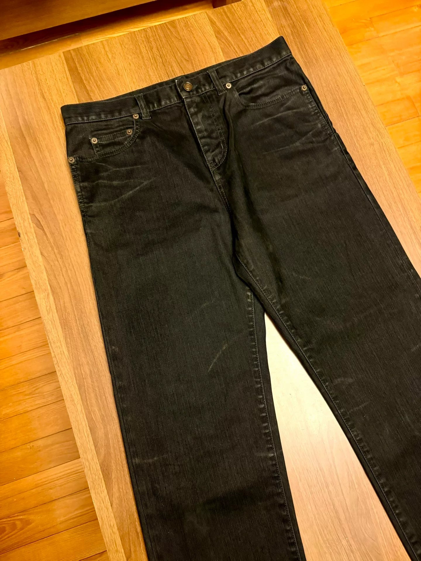 saint laurent black straight-leg waxed jeans