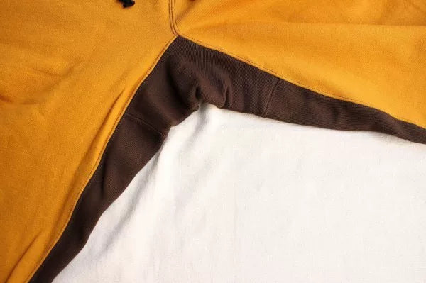 stylish yellow and brown sweatpants