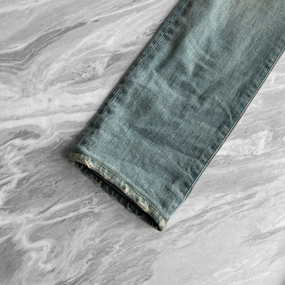 SAINT LAURENT Distressed Blue Jeans