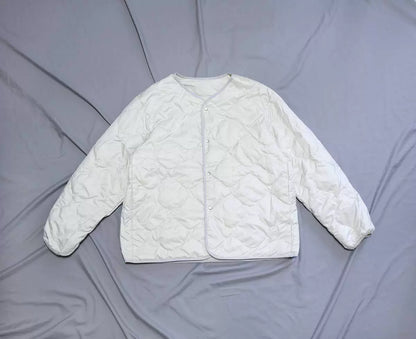 nanamica reversible down cardigan in ecru