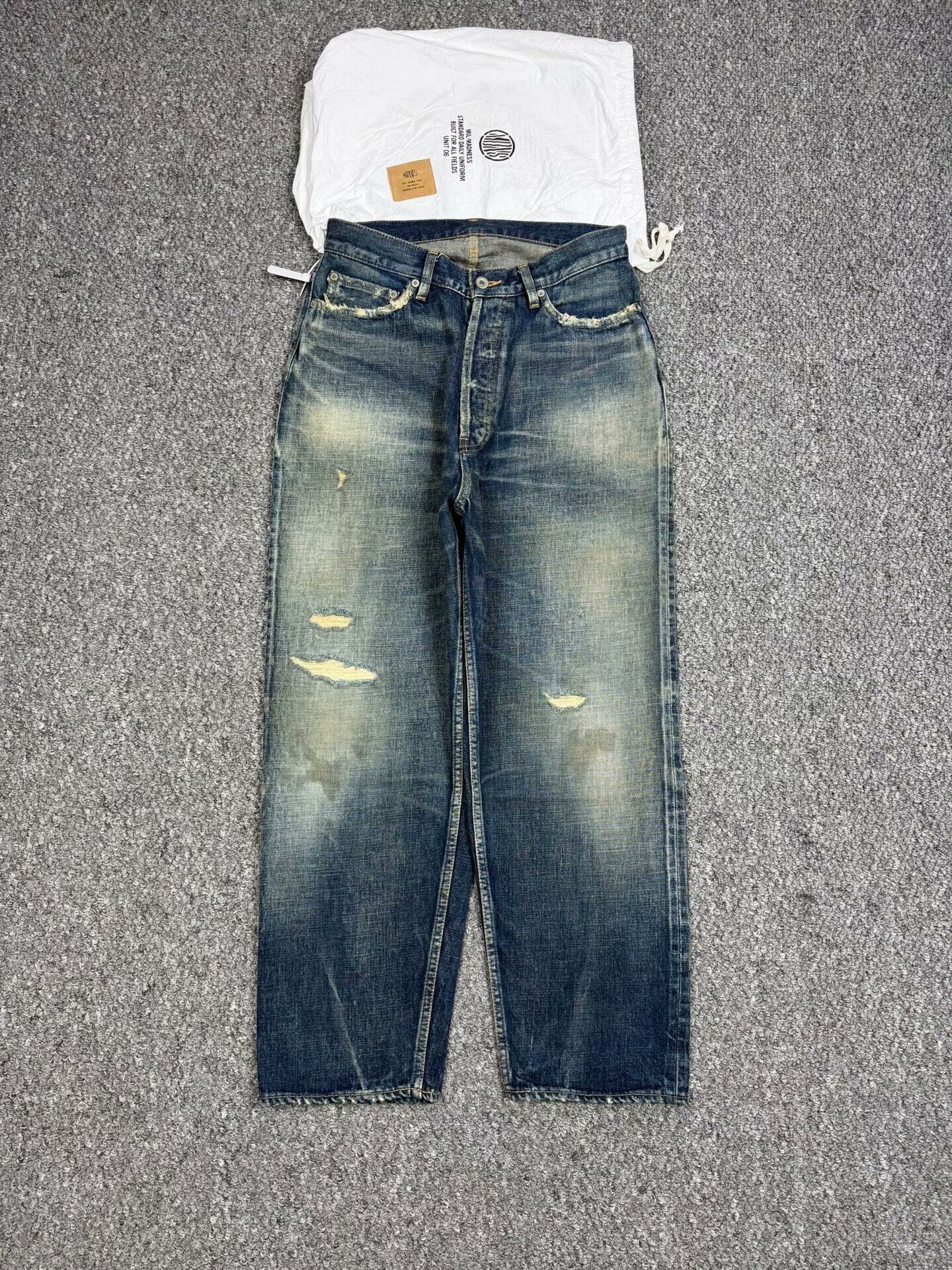 madness distressed denim pants for casual styling