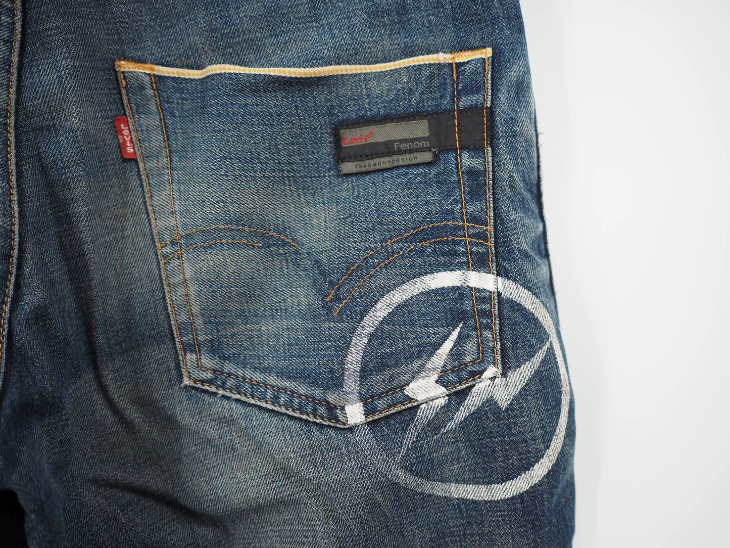 fenom gold badge distressed denim pants