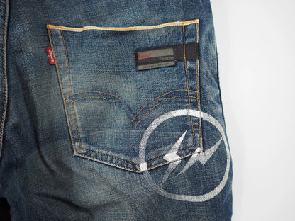 fenom gold badge distressed denim pants