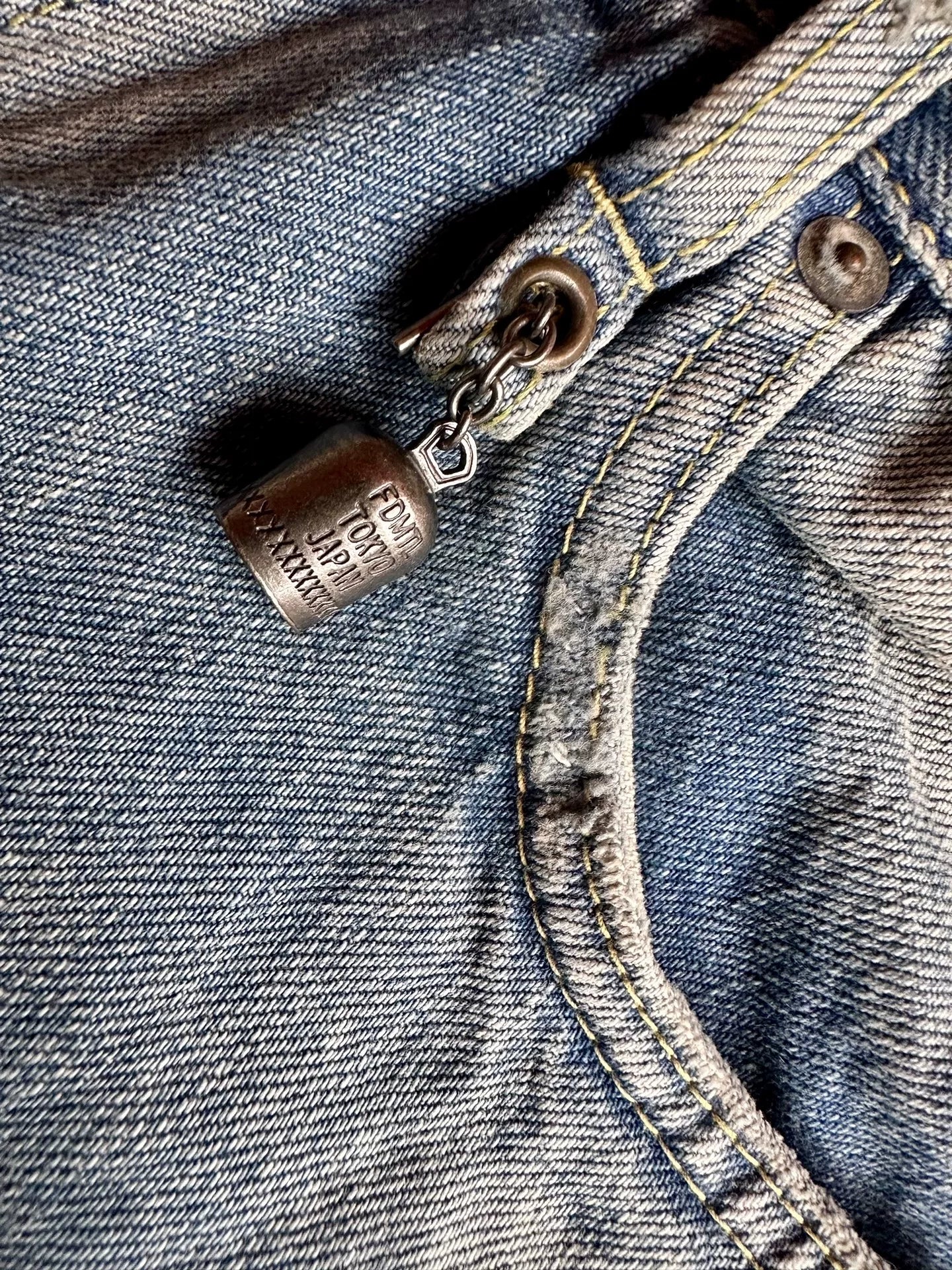 fdmtl slim fit denim distressed patchwork jeans