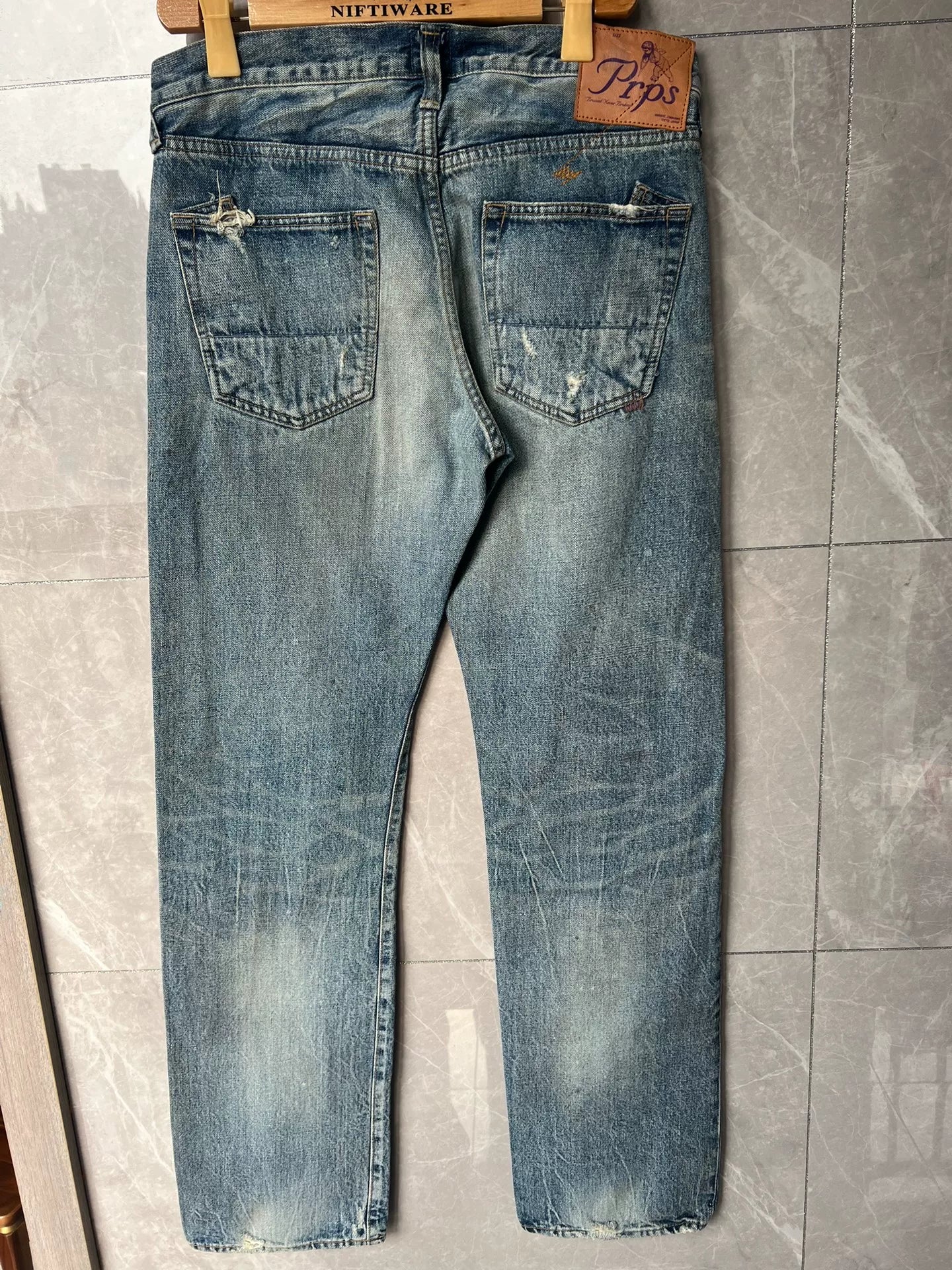 Light Blue Distressed Denim Jeans