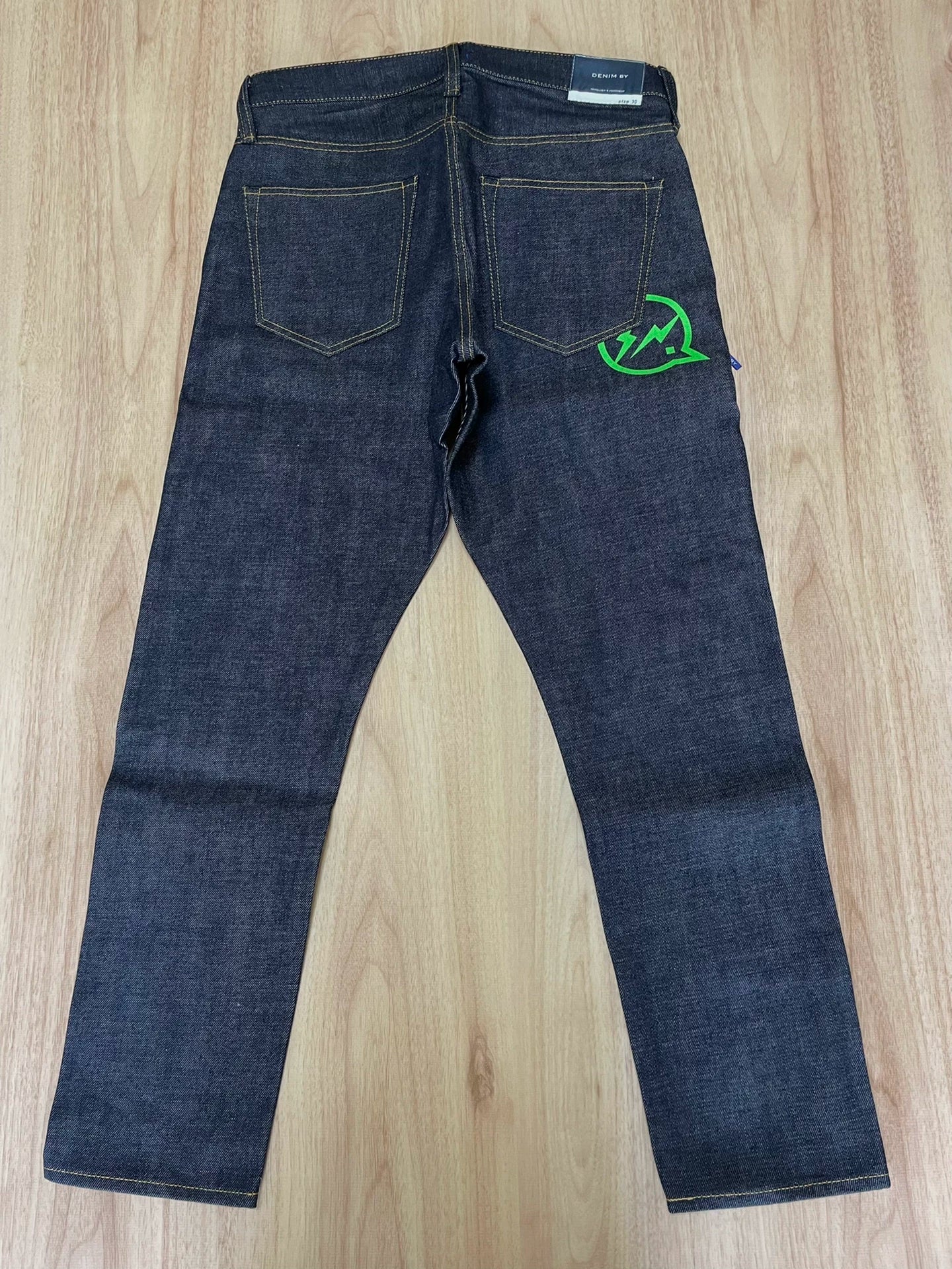 denim by vanquish green logo cropped jeans