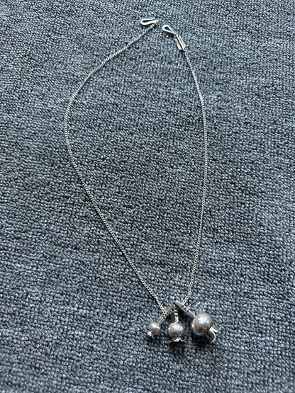 larry smith necklace with pomegranate flower pendants