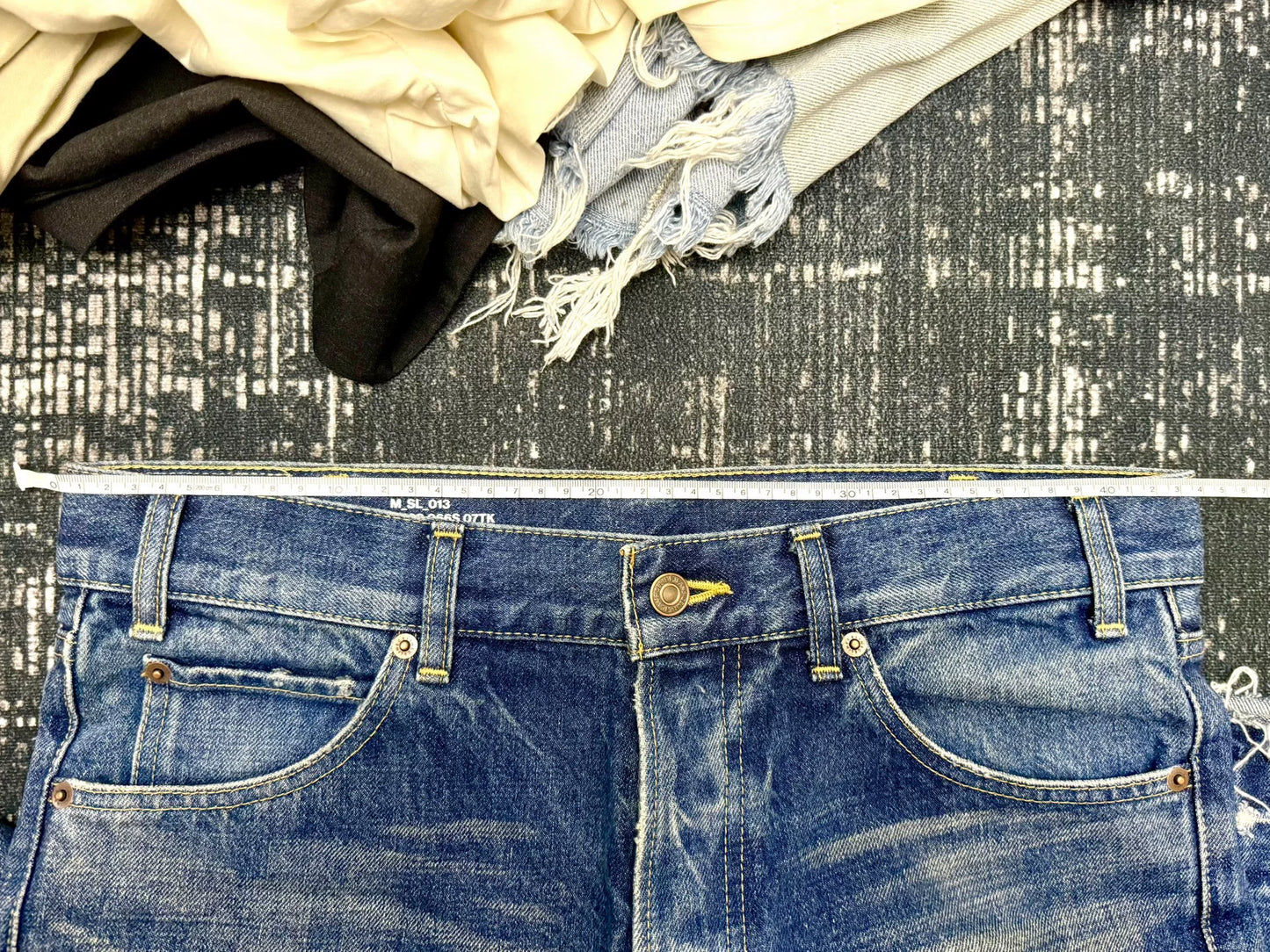 celine dark blue distressed denim pants