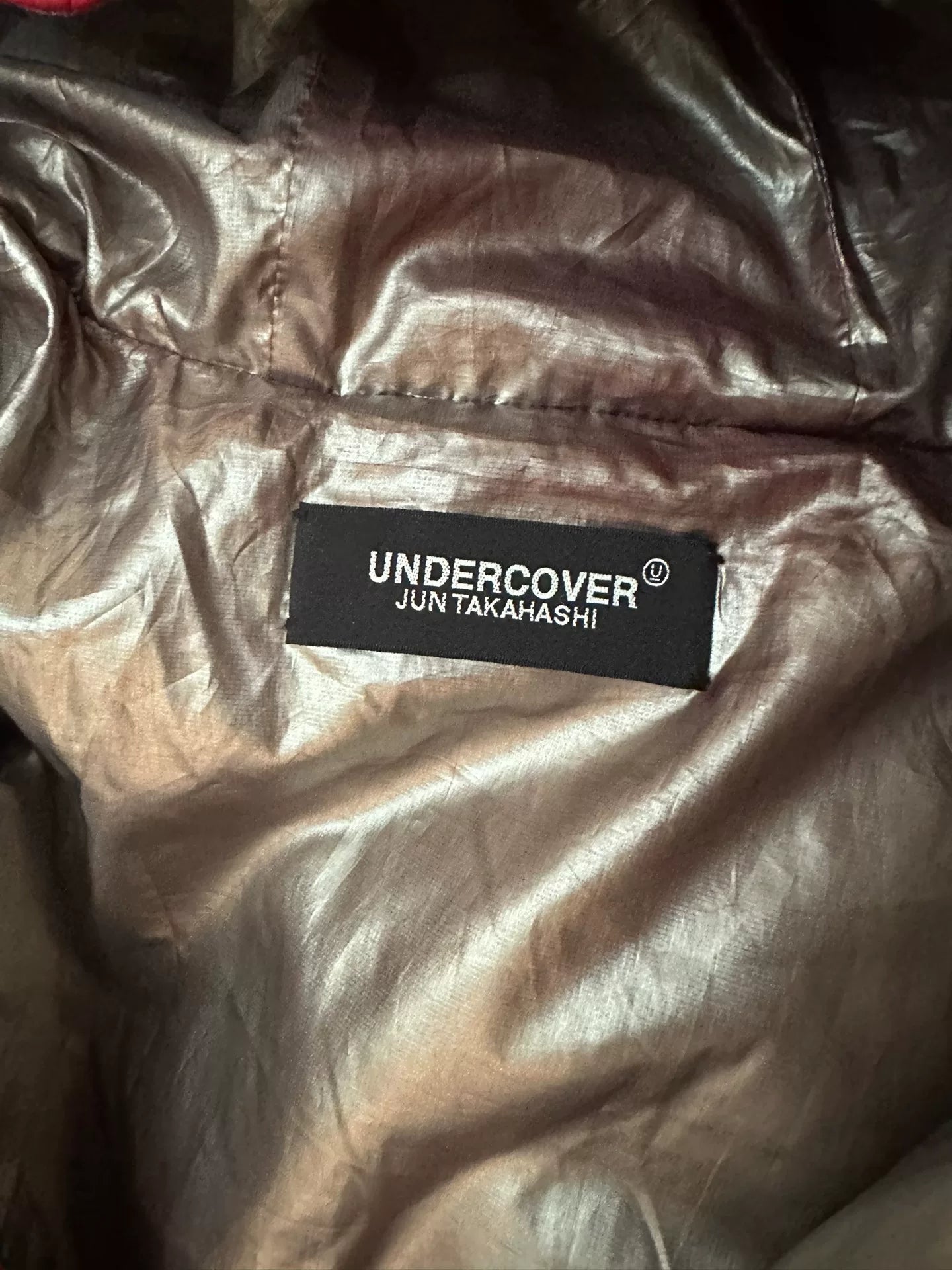 red astronaut hooded puffer jacket