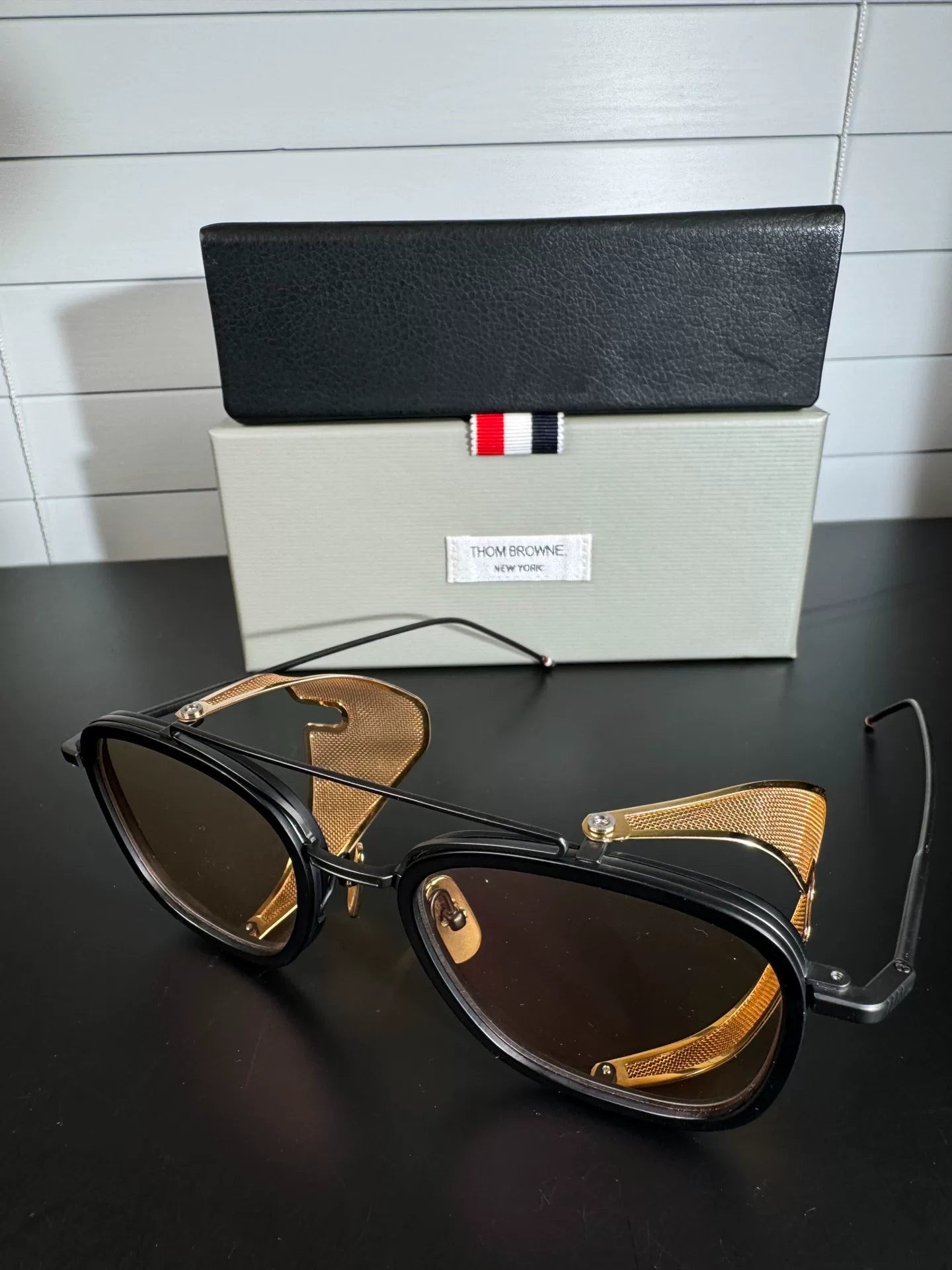 thom browne tb-808 sunglasses with gold accents