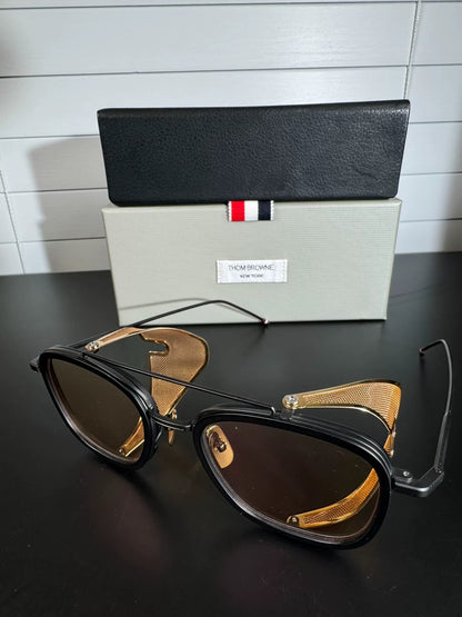 thom browne tb-808 sunglasses with gold accents
