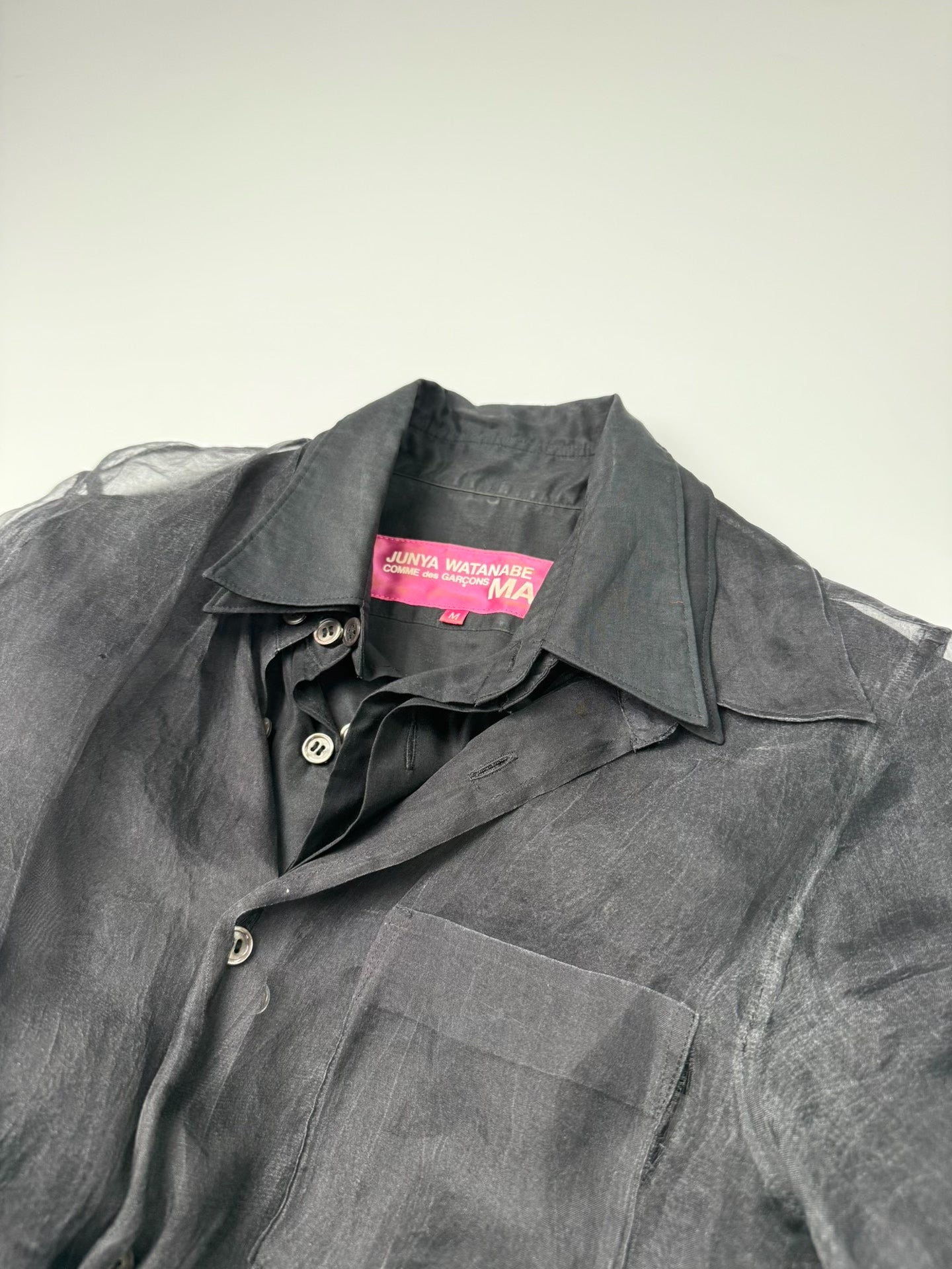 black sheer long shirt with deconstructed design