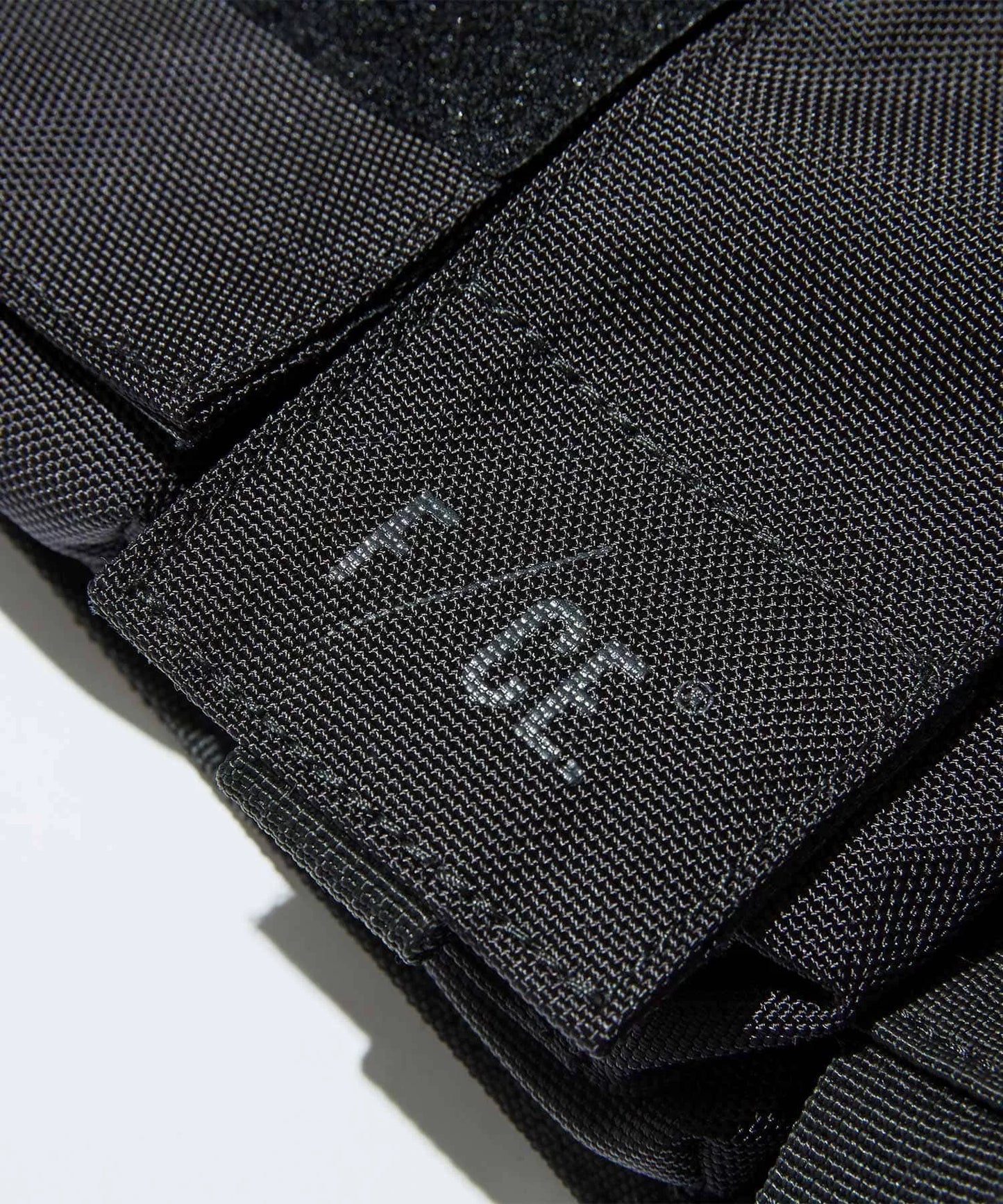 black utility vest bag from f/ce