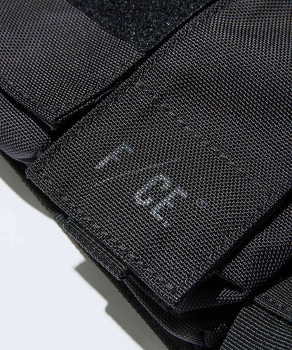 black utility vest bag from f/ce