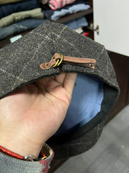 gray newsboy cap with plaid pattern