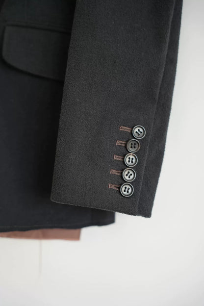 black tailored suit jacket by Sulvam