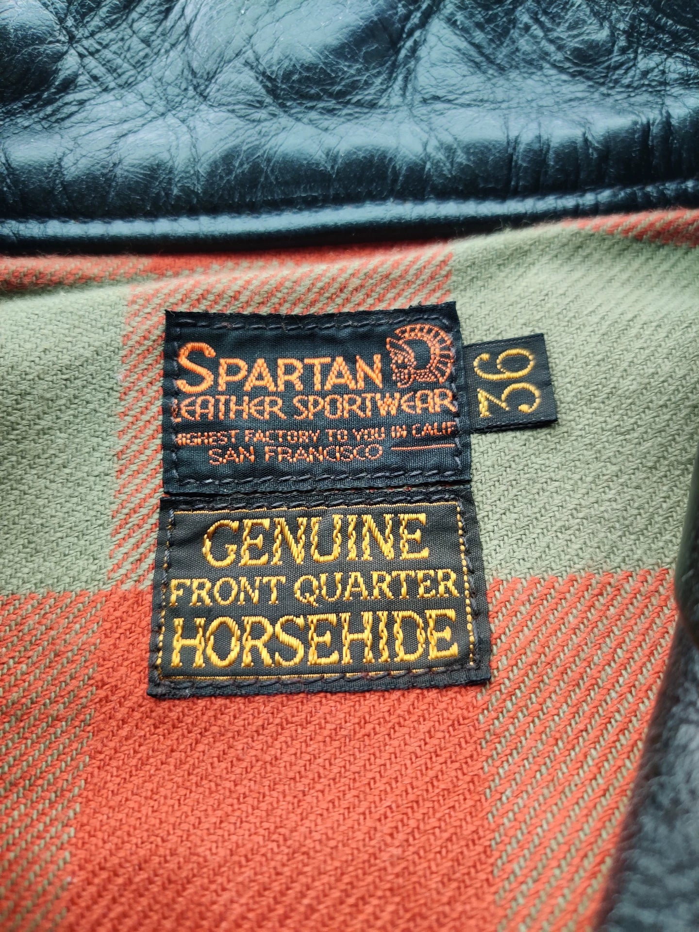 black leather jacket with snowflake pattern