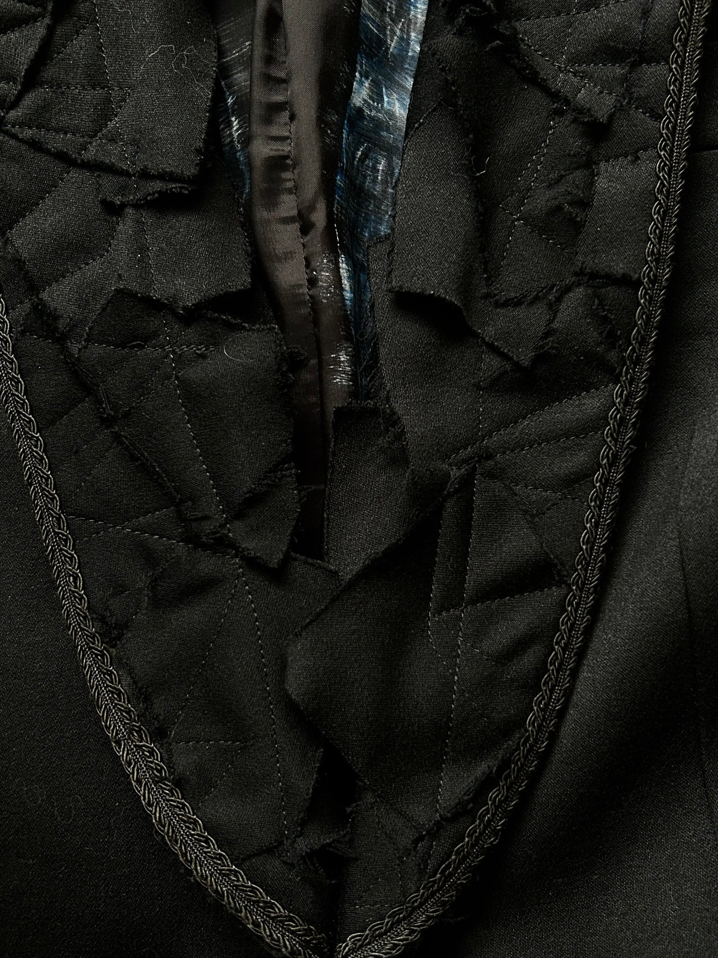 black ruffled tuxedo jacket by Kohshin Satoh