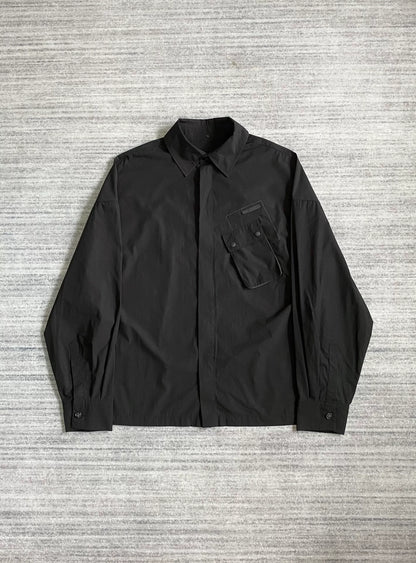 black pocket shirt with hidden buttons