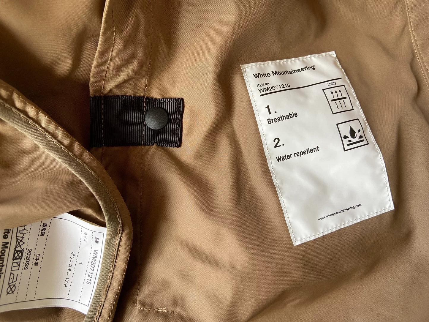 white mountaineering printed jacket