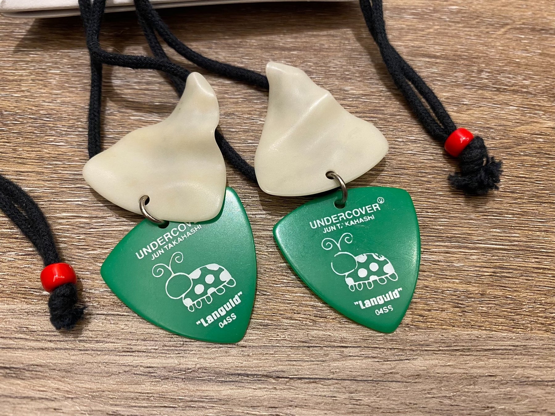 Undercover 04SS Luminous Guitar Pick Necklace